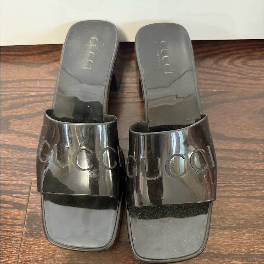 Gucci Black Mules with Embossed Strap and Soft Footbed